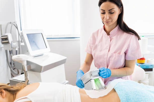 Cryolipolysis Andover 	 treatment on a person's back to reduce fat.